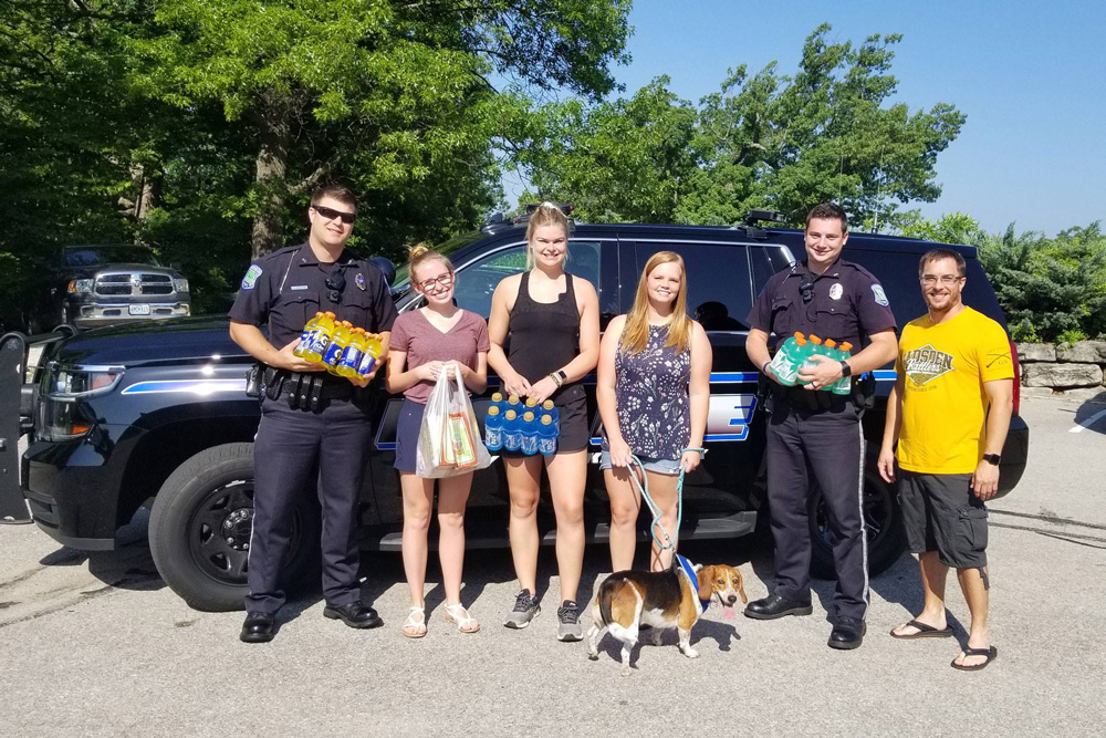 Members of MSW Team delivering drinks to Lake of the Ozarks Firefighters during a very hot day.  MSW team (left to right) &ndash; Katlyn Bartels, Abby Hetlage, Chasiti Begley, Keith Lucas.